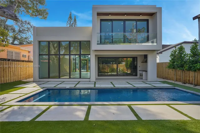 a view of front door of house with yard