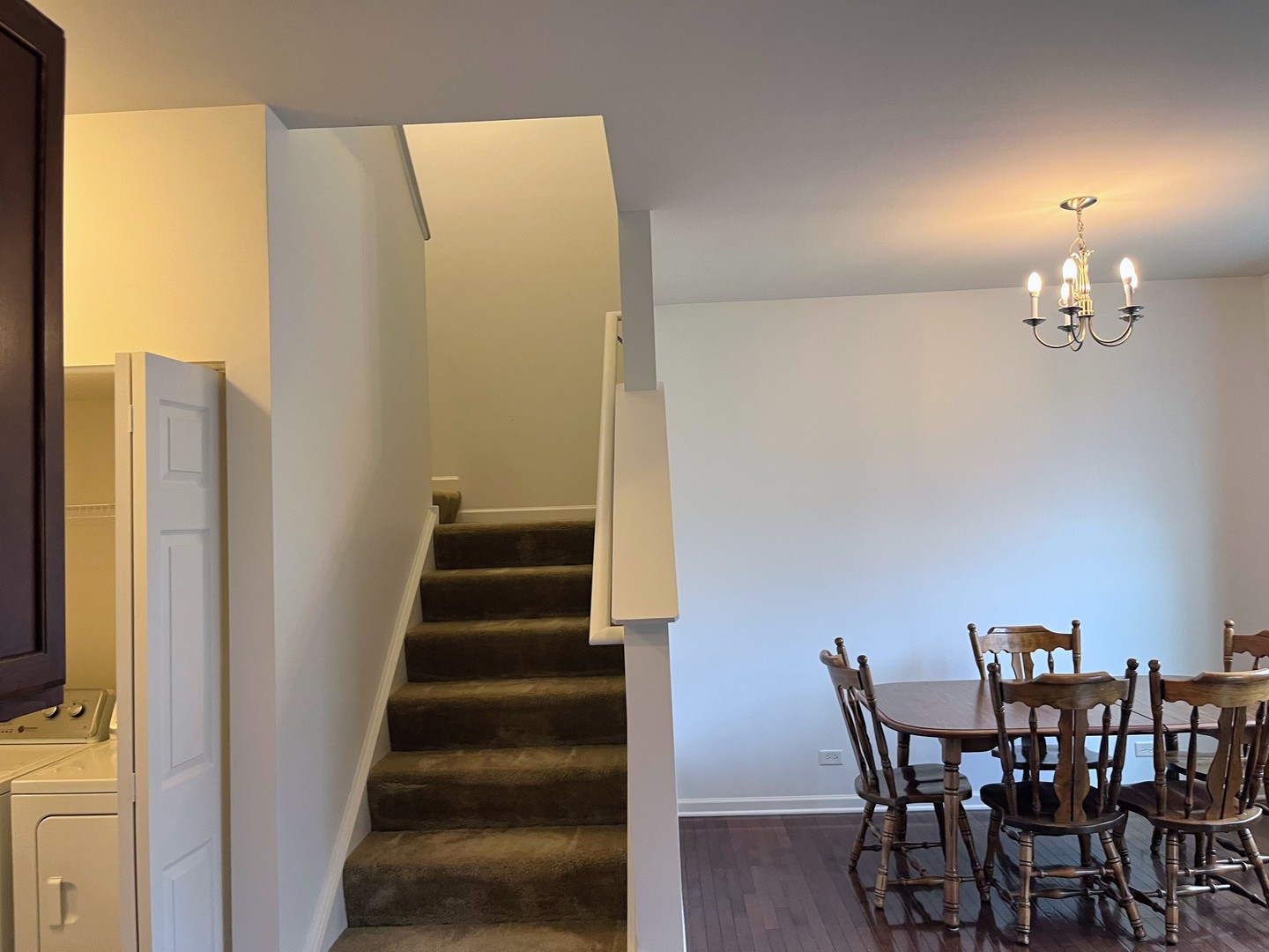 434 Town Center Boulevard Gilberts, IL 60136 - Photo 11 of 18 a view of a dining room with furniture and wooden floor
