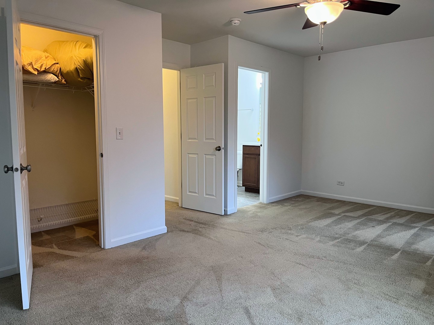 434 Town Center Boulevard Gilberts, IL 60136 - Photo 14 of 18 wooden floor and a chandelier fan in a room