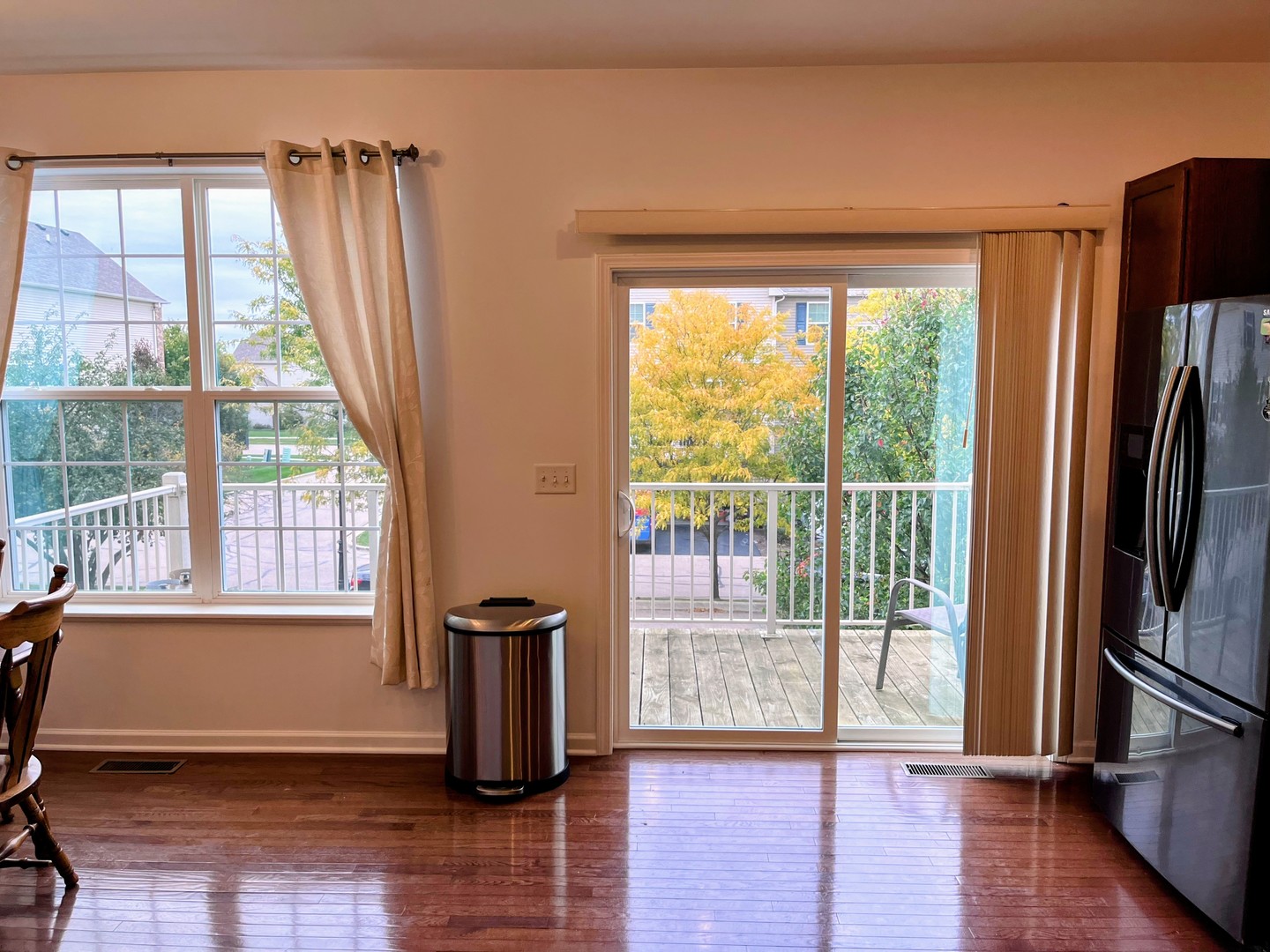 434 Town Center Boulevard Gilberts, IL 60136 - Photo 9 of 18 a view of an empty room with wooden floor and a window