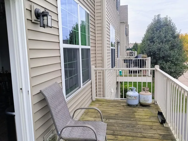 a balcony view with a couch