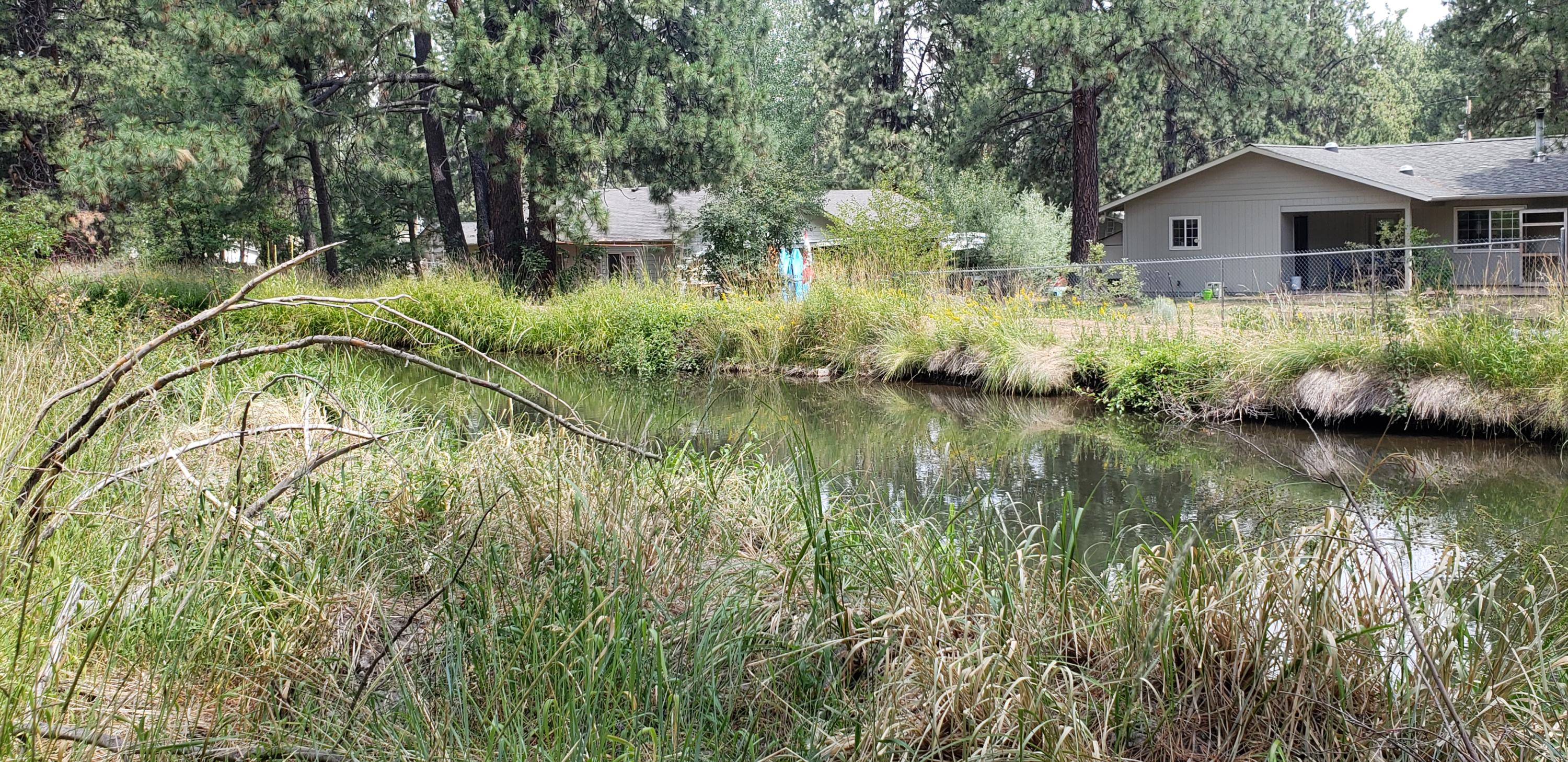 18892 Choctaw Road Bend, OR 97702 - Photo 5 of 26 Canal runs through back of property