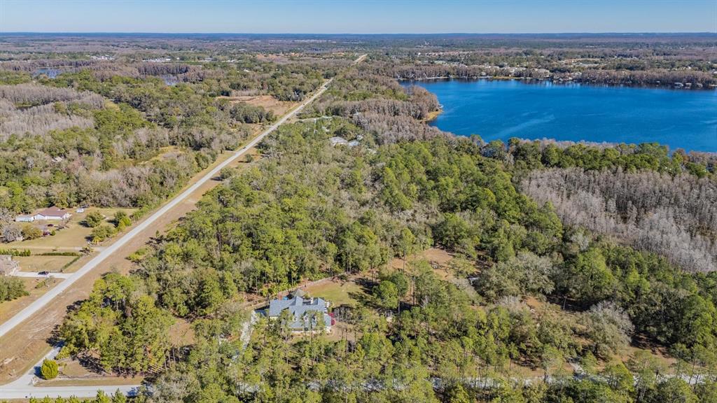 5504 Sun Up Road Land O' Lakes, FL 34638 - Photo 8 of 19 a view of a lake with a mountain
