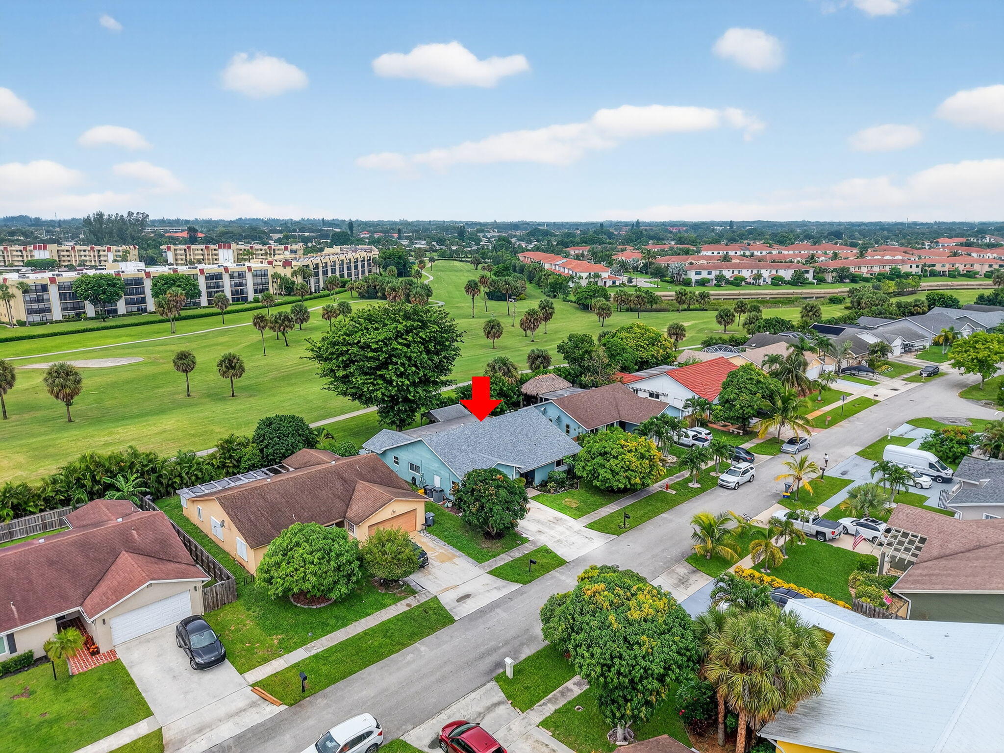 23265 Southwest 61st Avenue Boca Raton, FL 33428 - Photo 39 of 44 an aerial view of a city with lots of green space