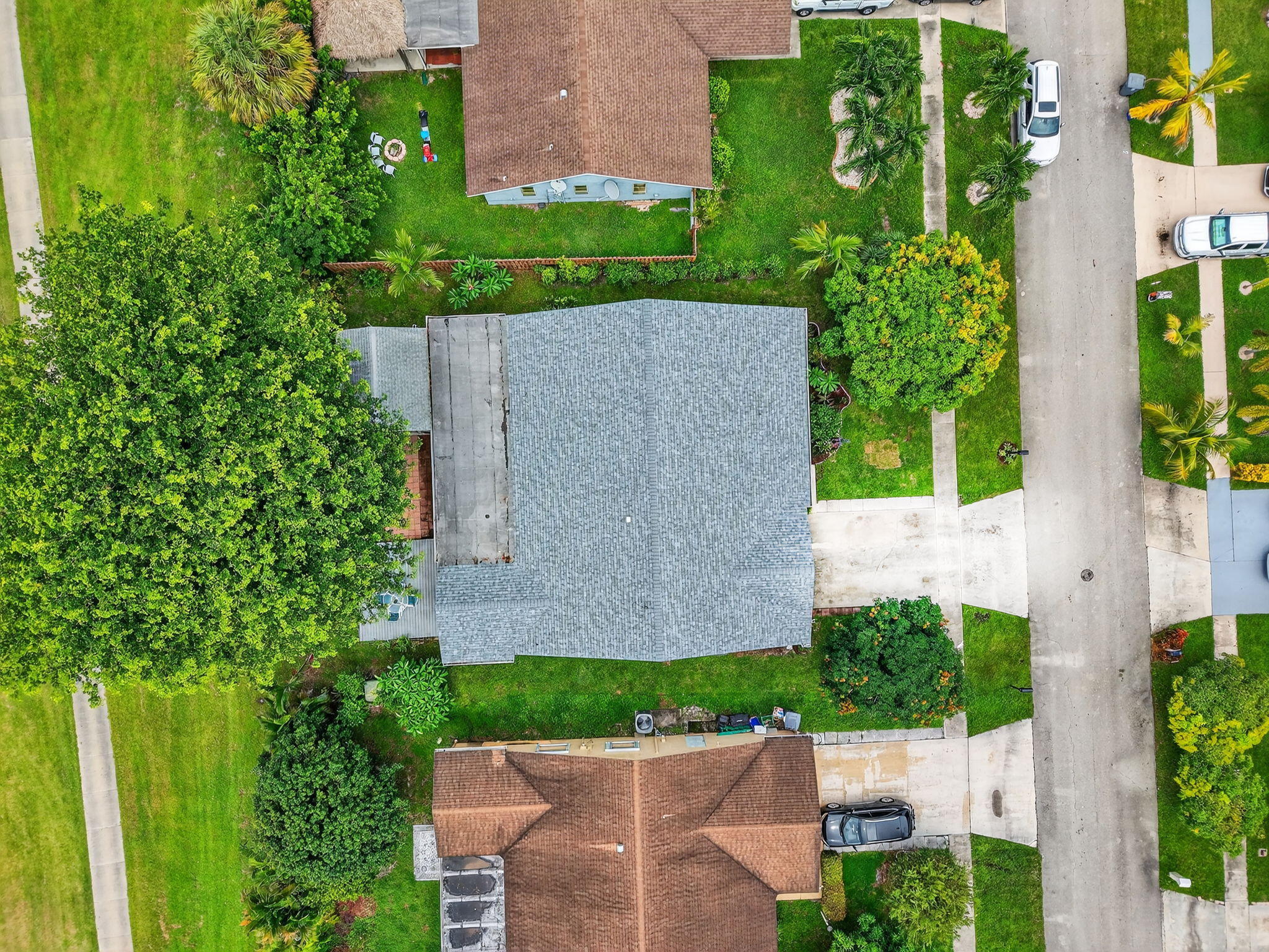 23265 Southwest 61st Avenue Boca Raton, FL 33428 - Photo 44 of 44 an aerial view of a house with a yard and garden