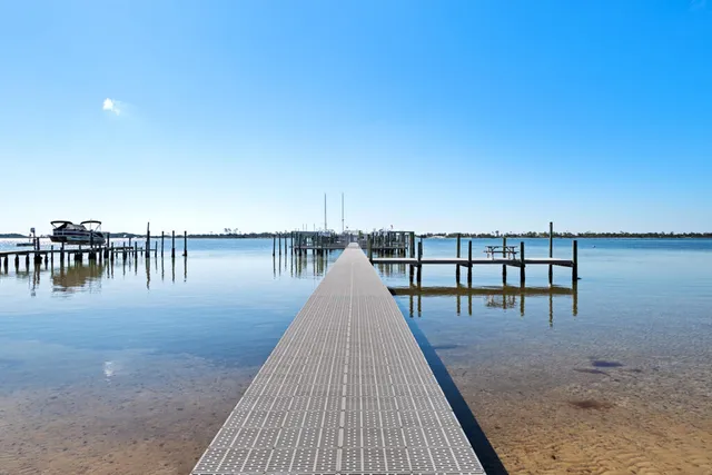 a view of a balcony with dining space