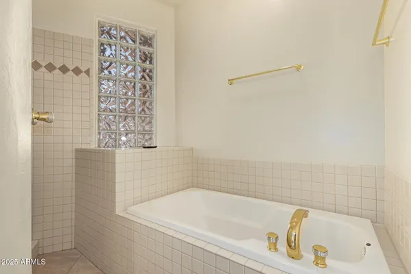 a bathroom with a bathtub