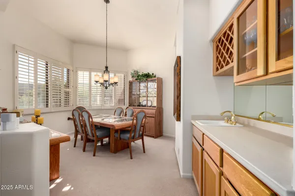 a view of a kitchen and dining room