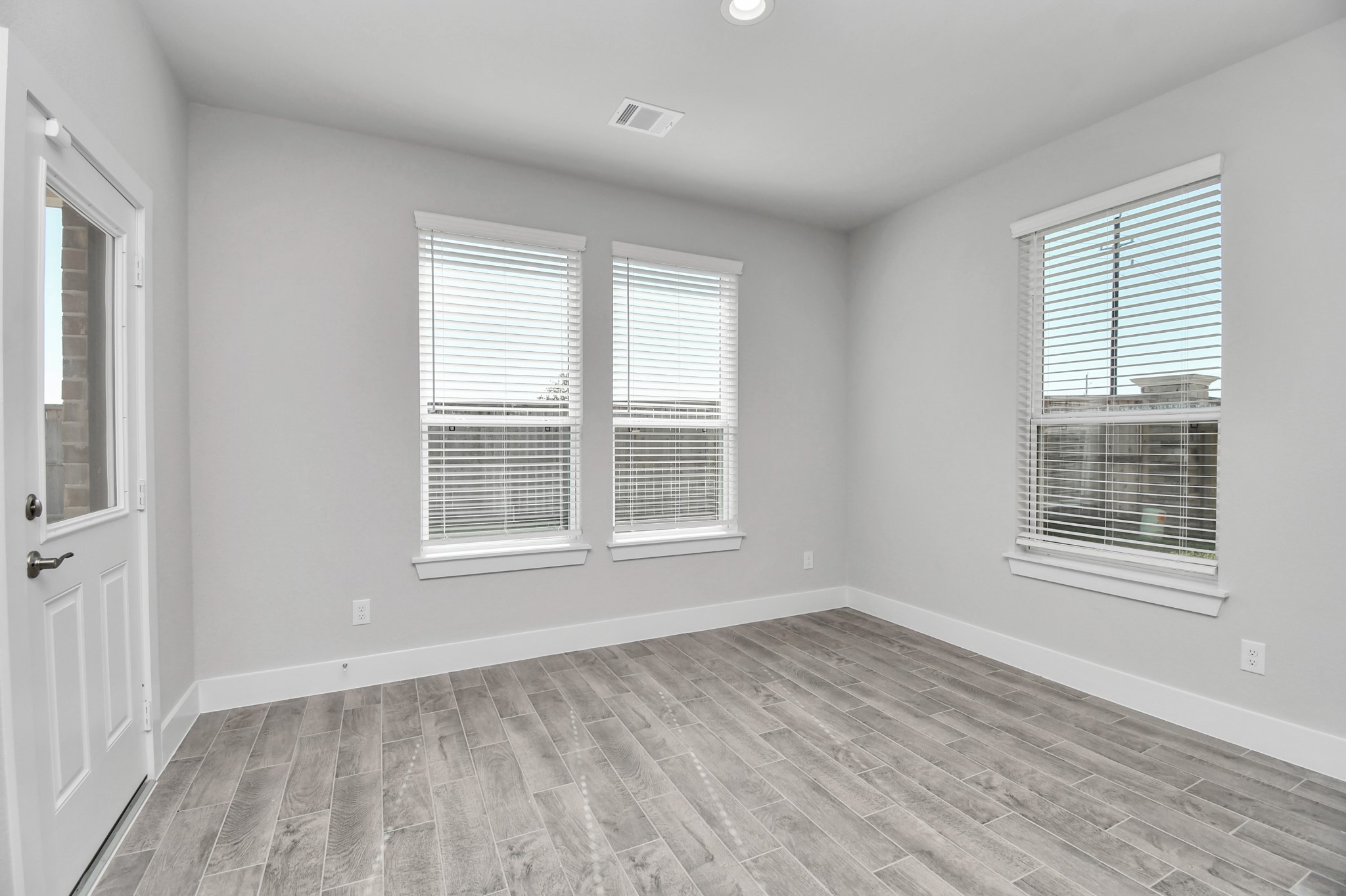 3103 Native Spg Drive Spring, TX 77373 - Photo 13 of 36 Enjoy breakfast with ease in the connected and cozy breakfast area, seamlessly integrated with the kitchen for utmost convenience. Step through the back door for a breath of fresh air onto the covered patio, extending your living space to the outdoors. Sample photo of completed home with similar floor plan. Actual colors and selections may vary.