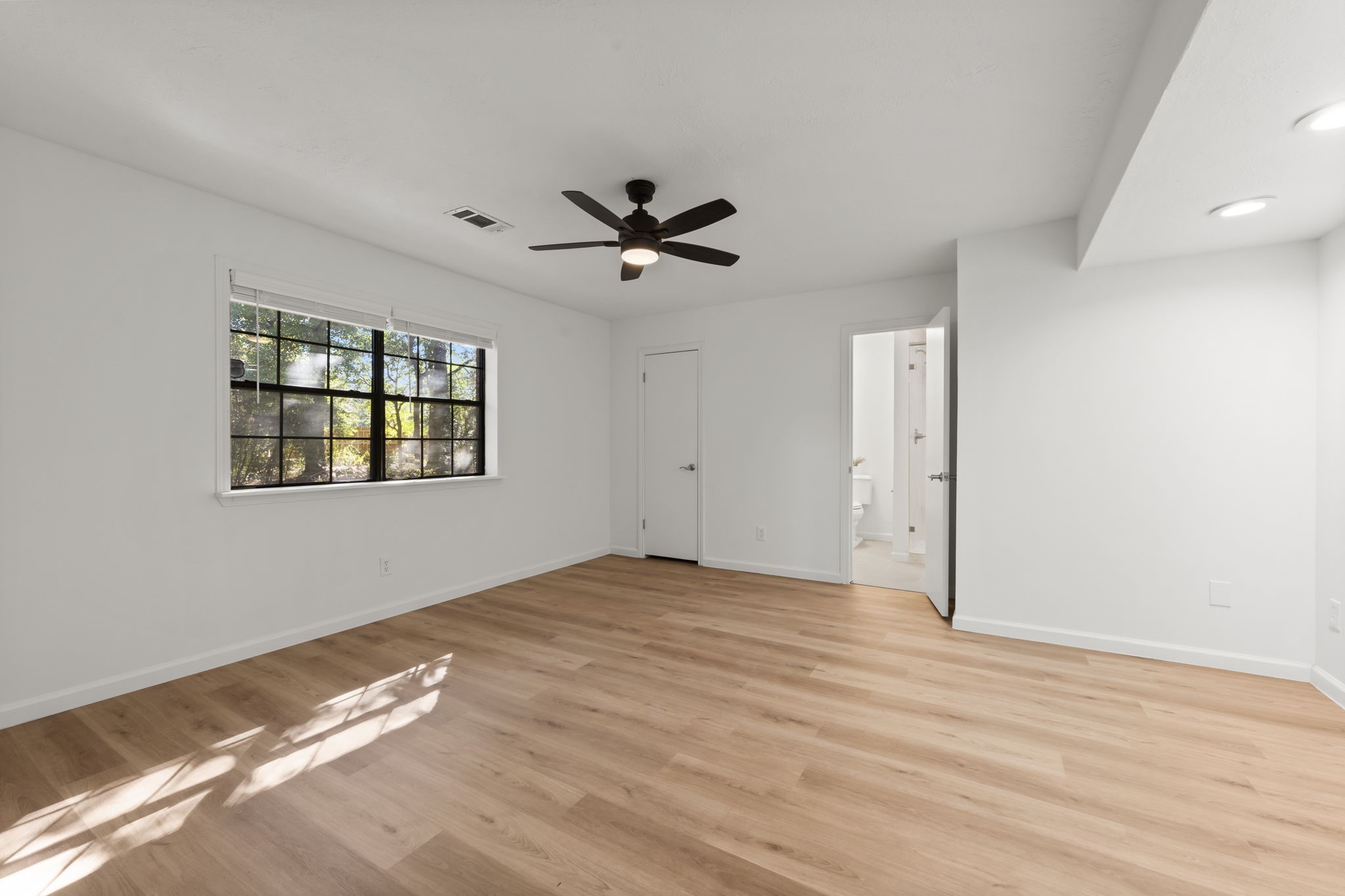 25206 Spring Ridge Drive Spring, TX 77386 - Photo 15 of 37 a view of an empty room with a window