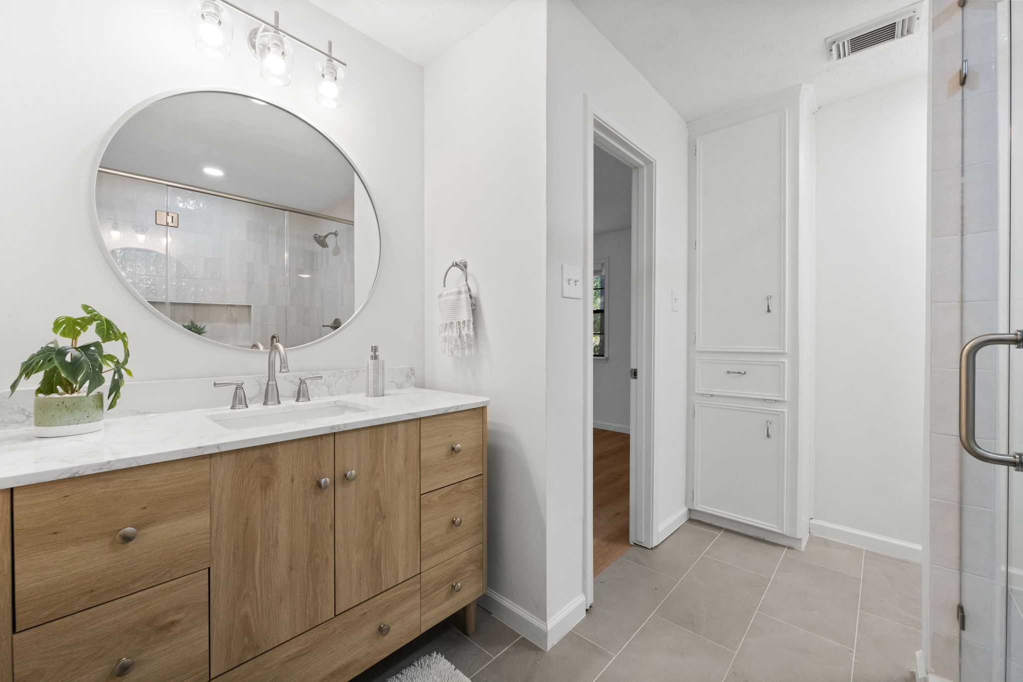 25206 Spring Ridge Drive Spring, TX 77386 - Photo 16 of 37 a spacious bathroom with a double vanity sink mirror and