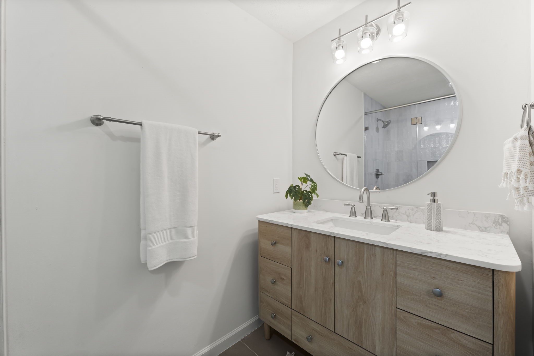 25206 Spring Ridge Drive Spring, TX 77386 - Photo 18 of 37 a bathroom with a sink vanity granite and a mirror