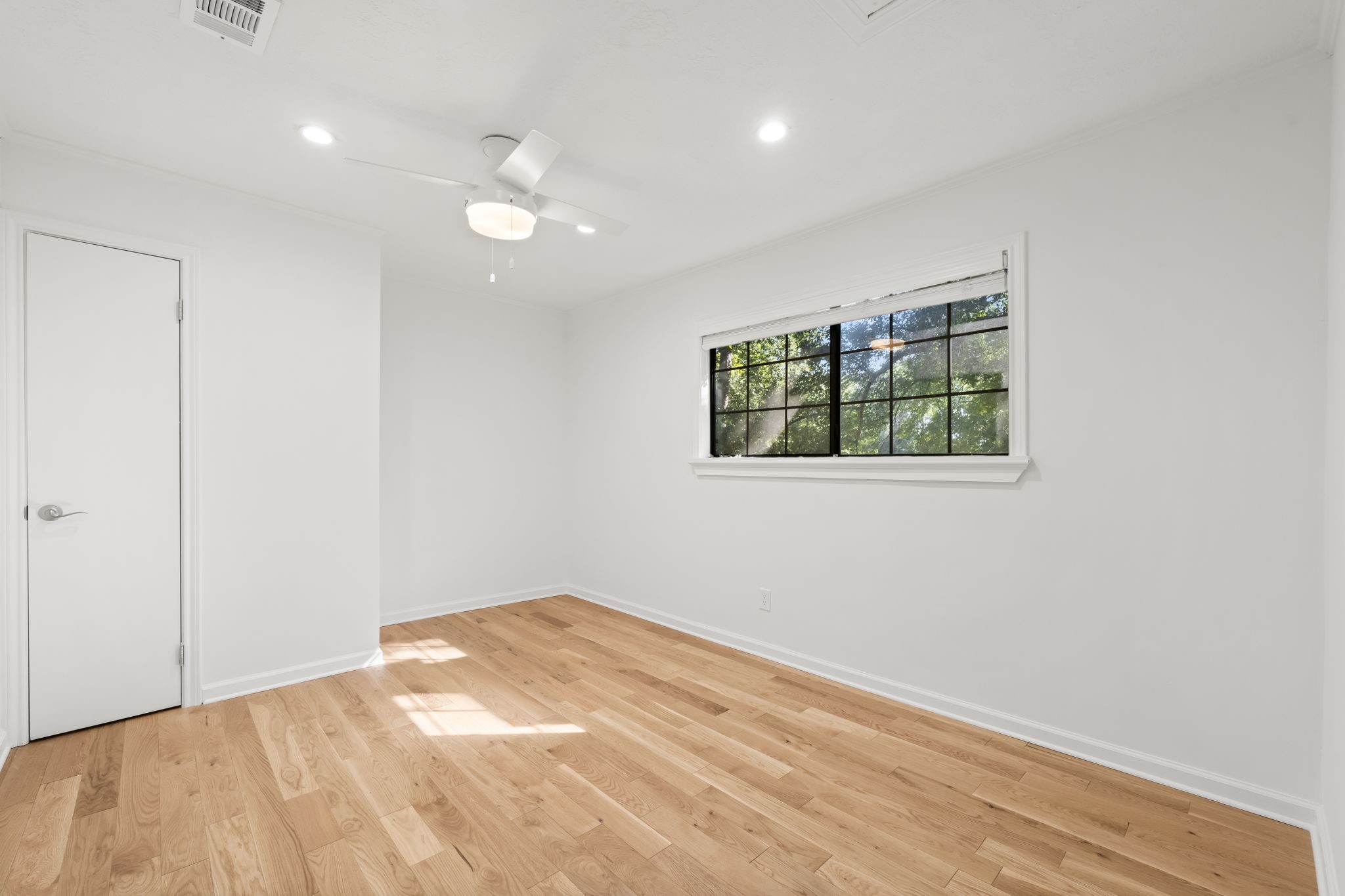 25206 Spring Ridge Drive Spring, TX 77386 - Photo 26 of 37 a view of empty room with wooden floor