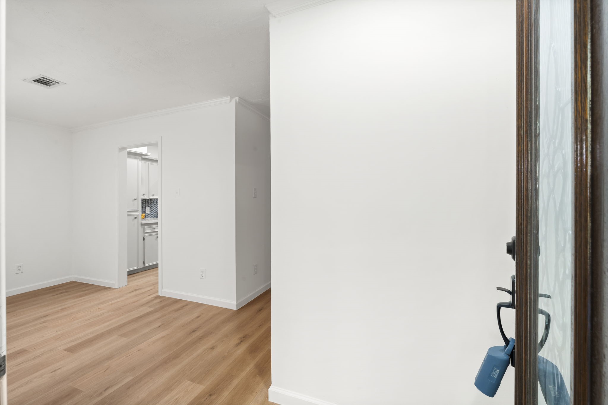 25206 Spring Ridge Drive Spring, TX 77386 - Photo 5 of 37 a view of a hallway with wooden floor