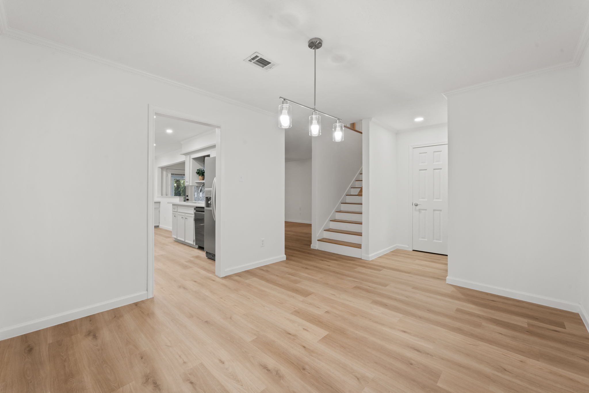 25206 Spring Ridge Drive Spring, TX 77386 - Photo 37 of 37 a view of an empty room with wooden floor and a ceiling fan