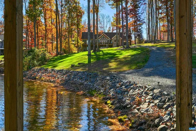 a view of balcony with wooden floor and outdoor seating
