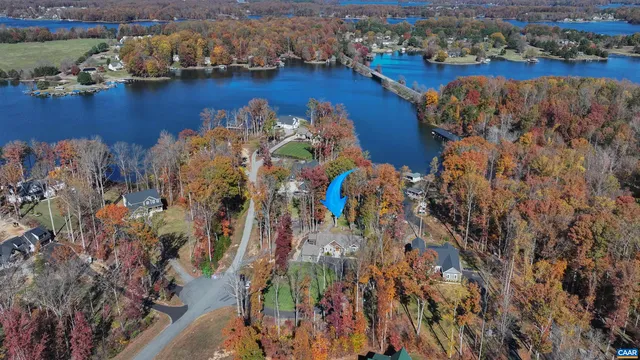 a view of swimming pool with outdoor seating and city view