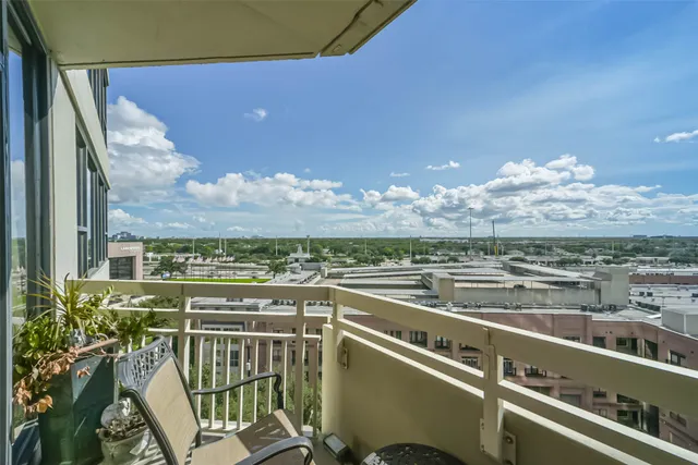 a view of a city from a balcony