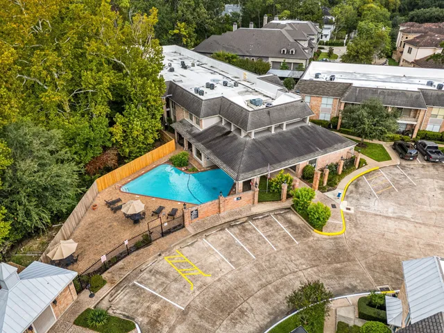 aerial view of a house with a garden