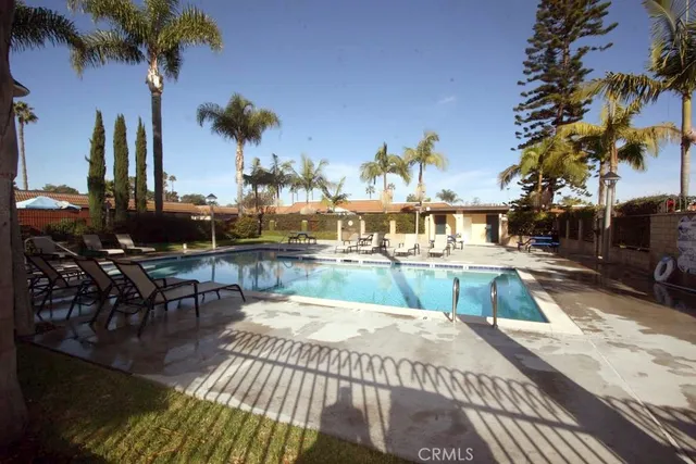 a view of a house with swimming pool