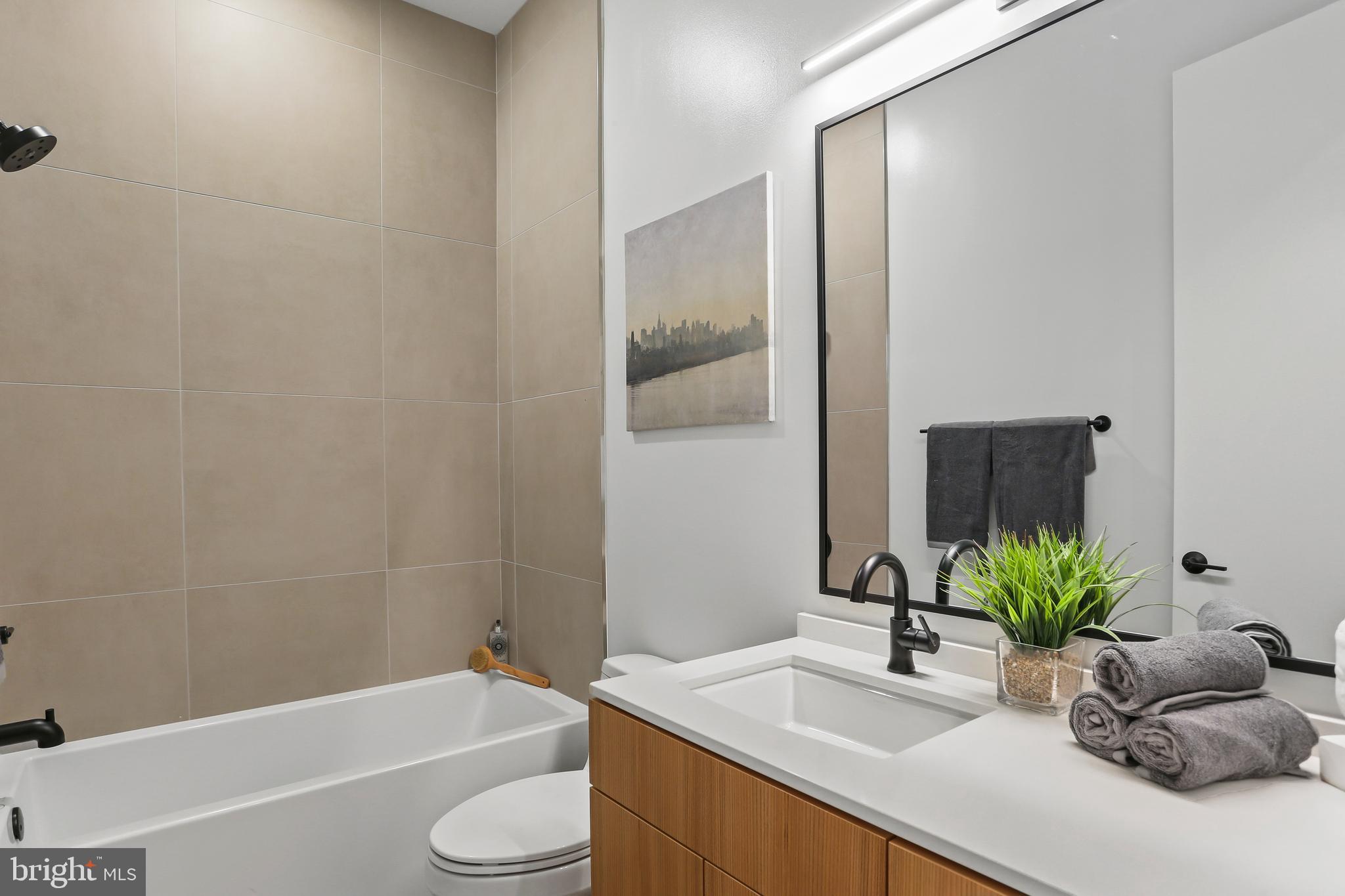 1434 Chapin Street Northwest, Unit 6 Washington, DC 20009 - Photo 7 of 37 Guest Bathroom w. Porcelanosa Tile