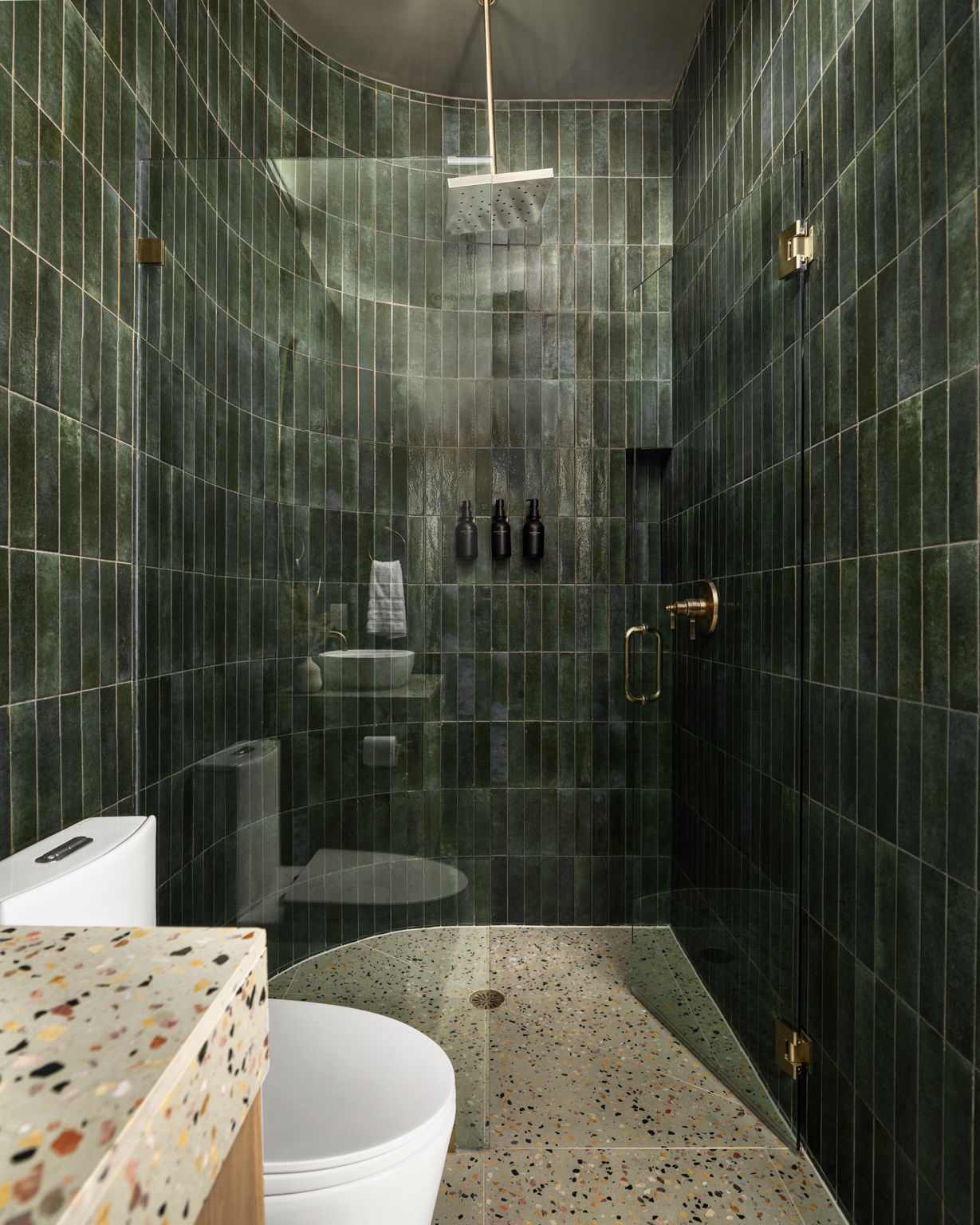 Undisclosed Address Austin, TX 78702 - Photo 18 of 38 Full bathroom with a stall shower, vanity, and tile walls