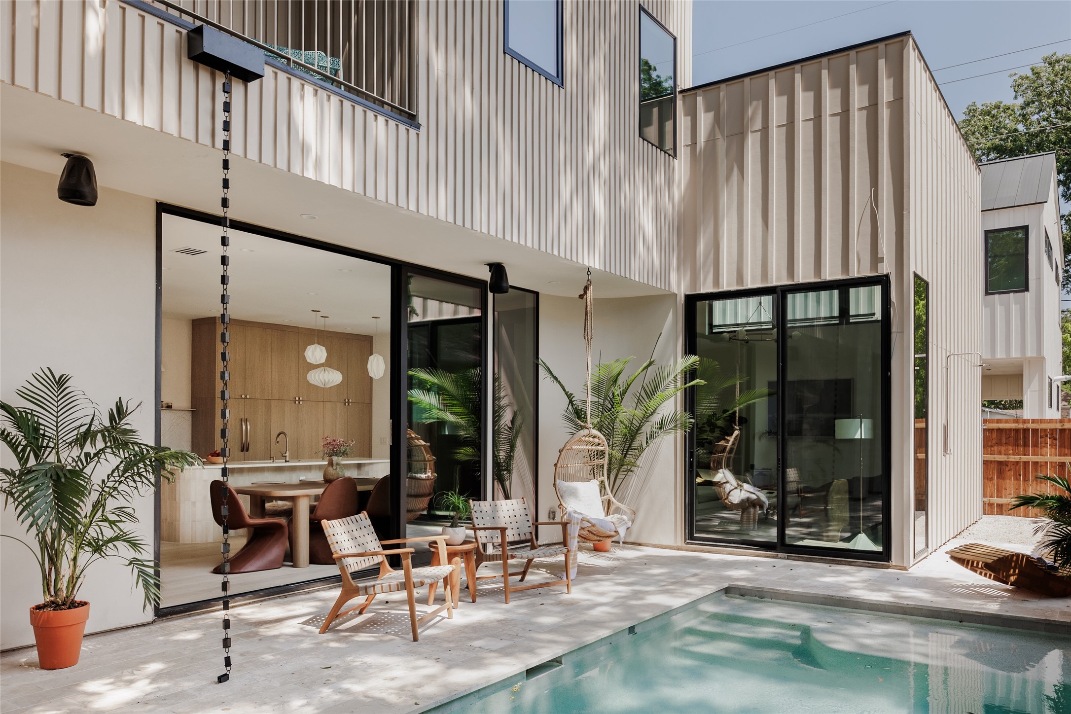 Undisclosed Address Austin, TX 78702 - Photo 2 of 38 Back of property with an outdoor pool and a patio area