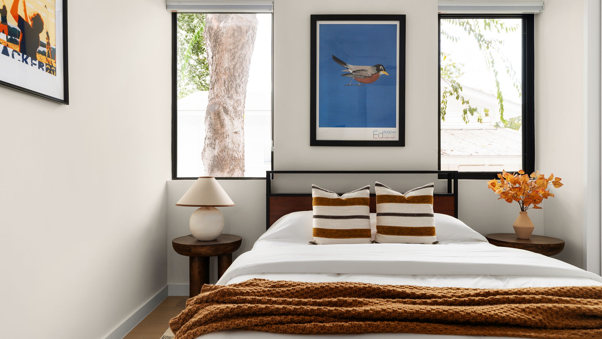 Undisclosed Address Austin, TX 78702 - Photo 29 of 38 Bedroom featuring wood finished floors and baseboards