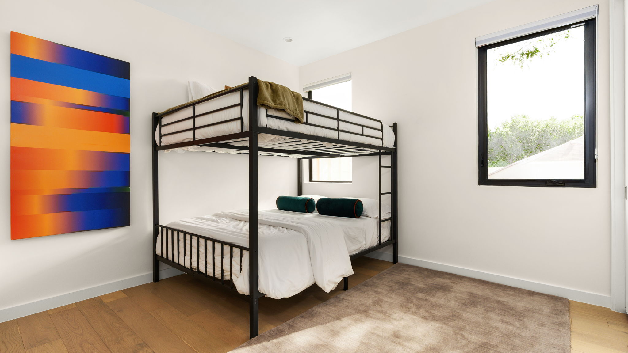 Undisclosed Address Austin, TX 78702 - Photo 33 of 38 Bedroom with light wood-type flooring and baseboards