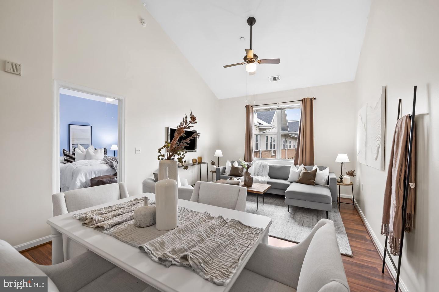 23 Pierside Drive, Unit 413 Baltimore, MD 21230 - Photo 13 of 36 a living room with furniture and a window