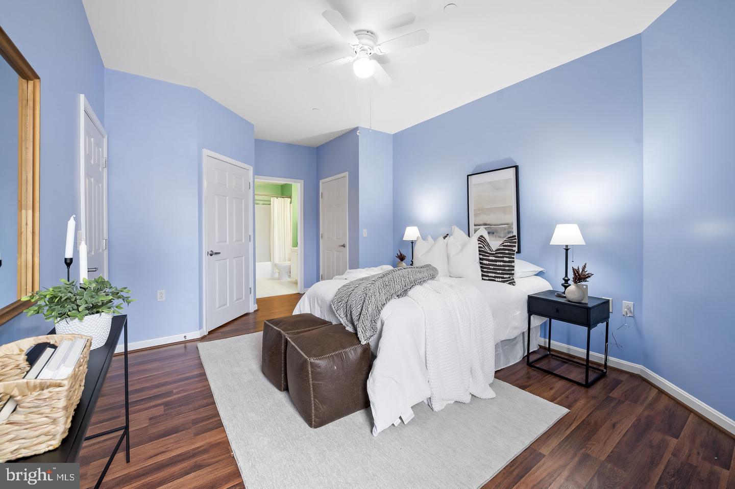 23 Pierside Drive, Unit 413 Baltimore, MD 21230 - Photo 17 of 36 a bed room with a bed and a table