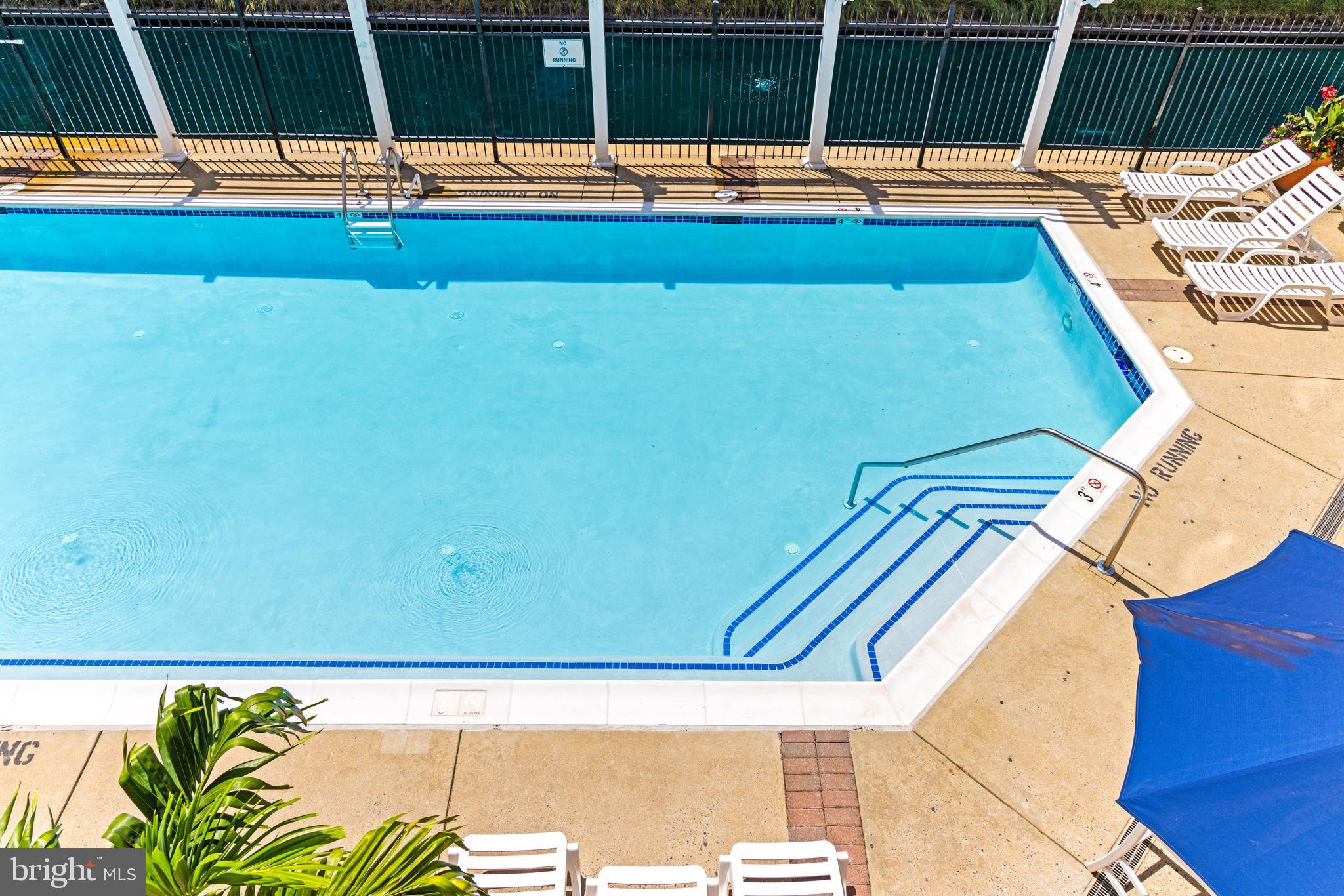 23 Pierside Drive, Unit 413 Baltimore, MD 21230 - Photo 30 of 36 a view of swimming pool with patio