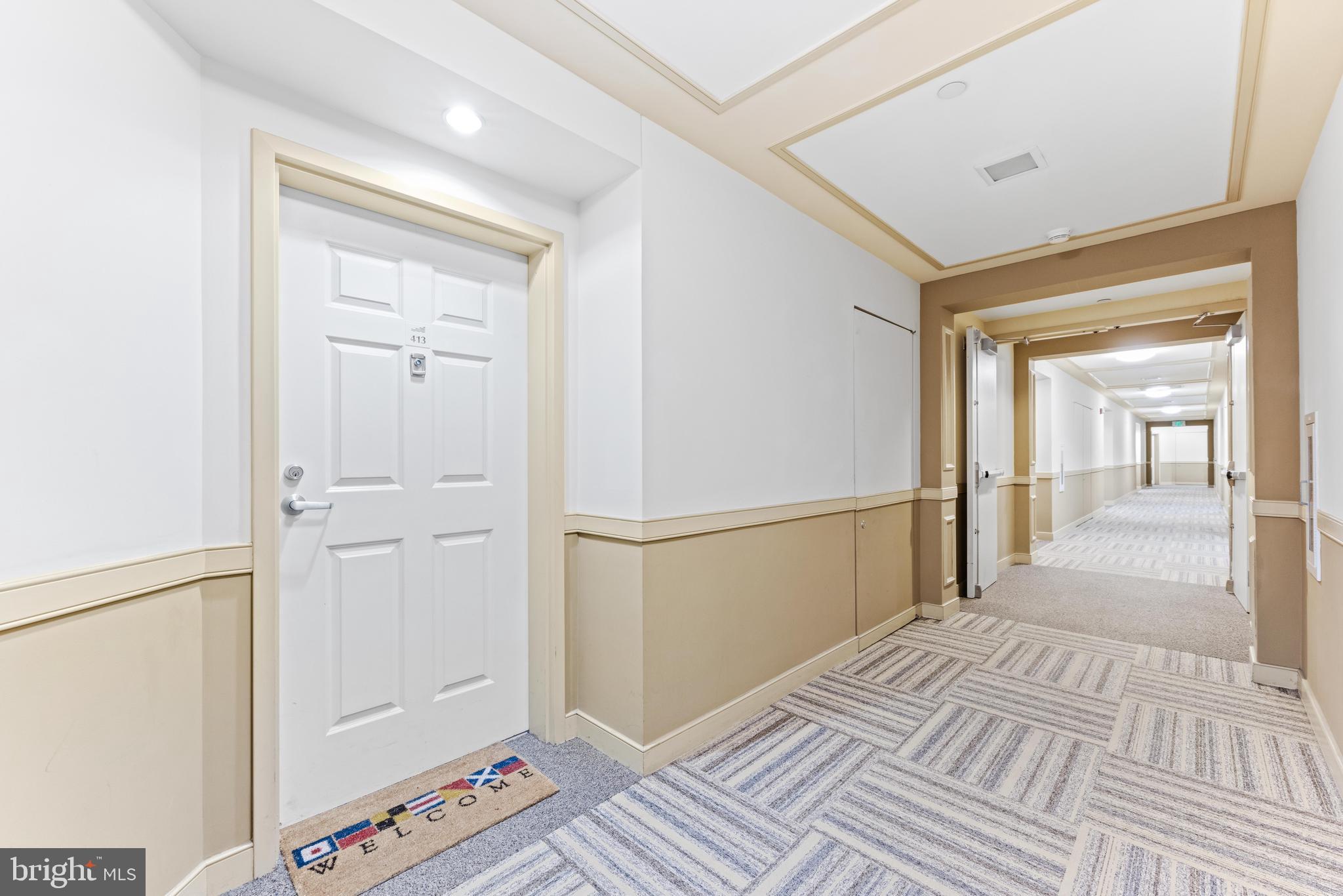 23 Pierside Drive, Unit 413 Baltimore, MD 21230 - Photo 34 of 36 a view of a bedroom with wooden floor