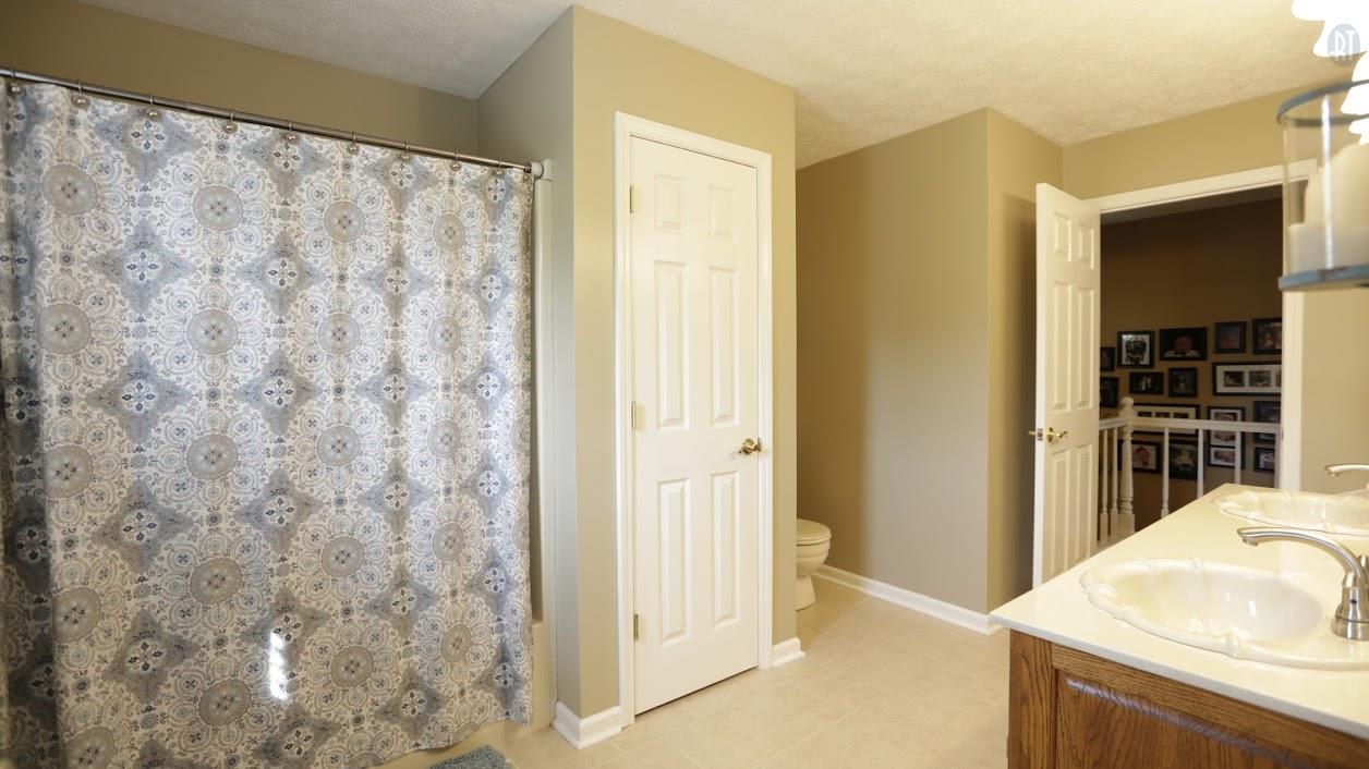 402 Ranch Road Portland, TN 37148 - Photo 19 of 24 a bathroom with a sink and a mirror