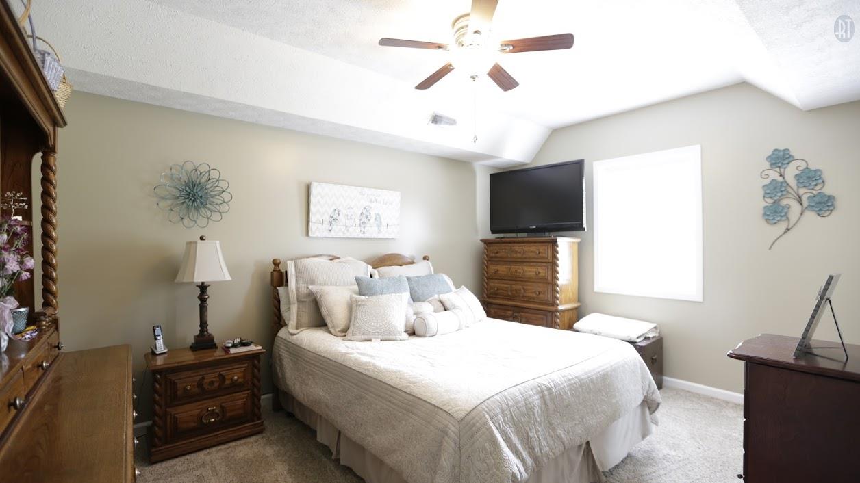 402 Ranch Road Portland, TN 37148 - Photo 22 of 24 a bedroom with a bed and a flat screen tv