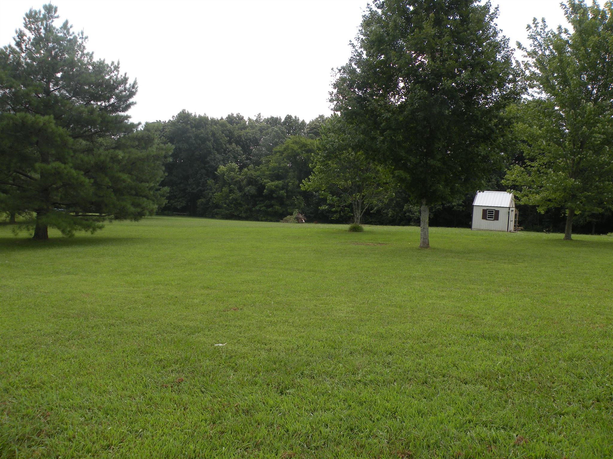 402 Ranch Road Portland, TN 37148 - Photo 7 of 24 a view of a field with a trees