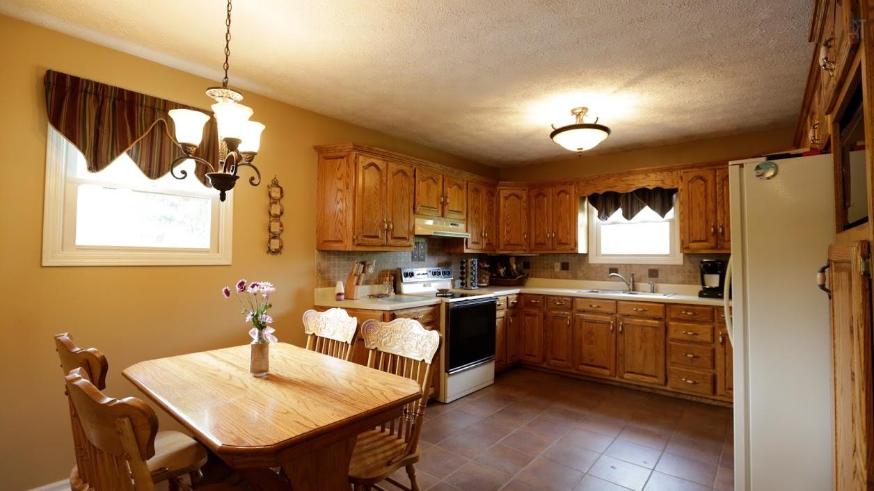 402 Ranch Road Portland, TN 37148 - Photo 10 of 24 a kitchen with sink cabinets and window