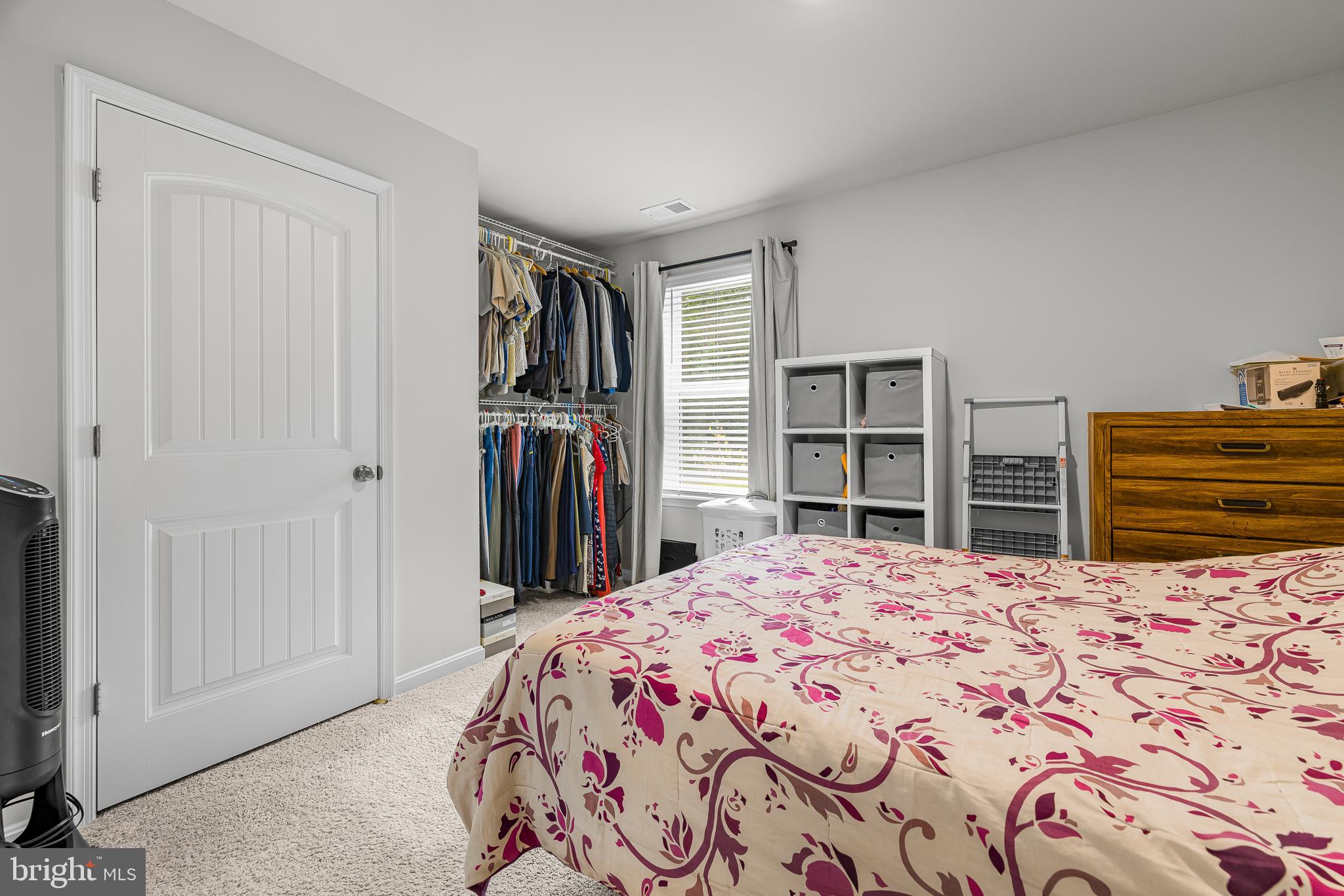 459 Currant Circle Magnolia, DE 19962 - Photo 33 of 39 a bedroom with a bed and a closet