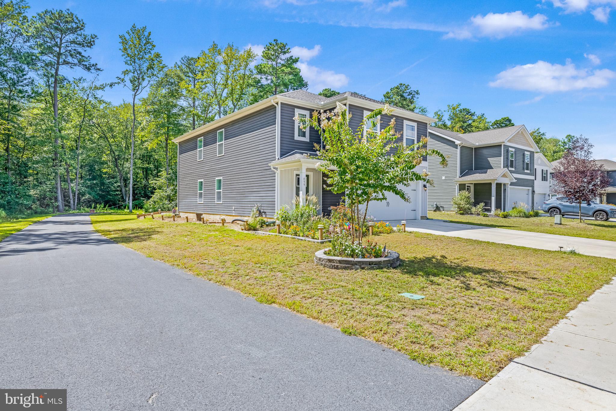 459 Currant Circle Magnolia, DE 19962 - Photo 37 of 39 a view of a house with swimming pool and a yard