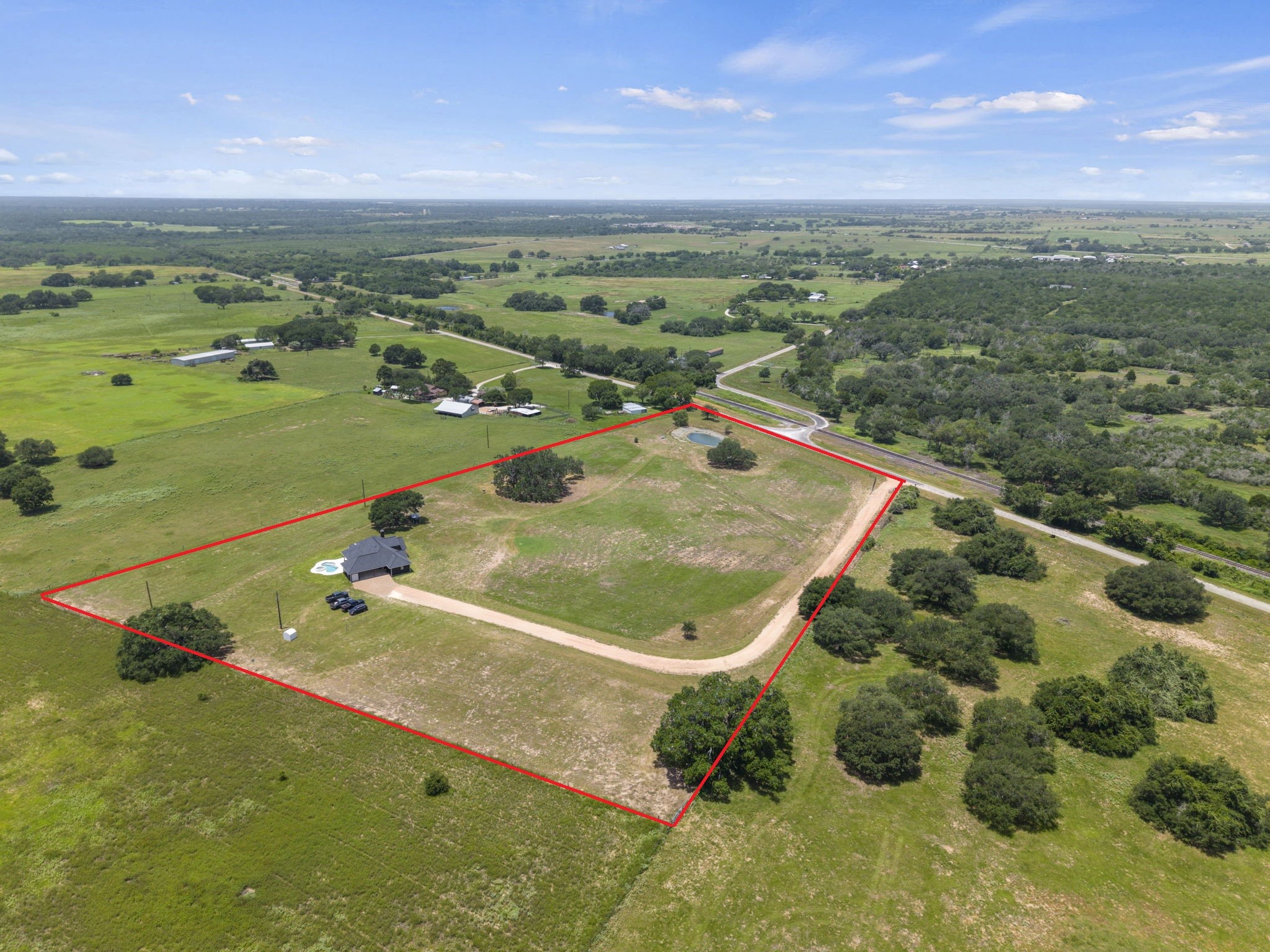 1655 Old Cuero Road Yoakum, TX 77995 - Photo 22 of 24 Surrounded by picturesque countryside, the land offers panoramic views in every direction while maintaining convenient access to nearby amenities. Whether you're seeking a private homestead, hobby farm, or simply room to spread out, this remarkable property provides endless possibilities in a beautiful rural setting.
