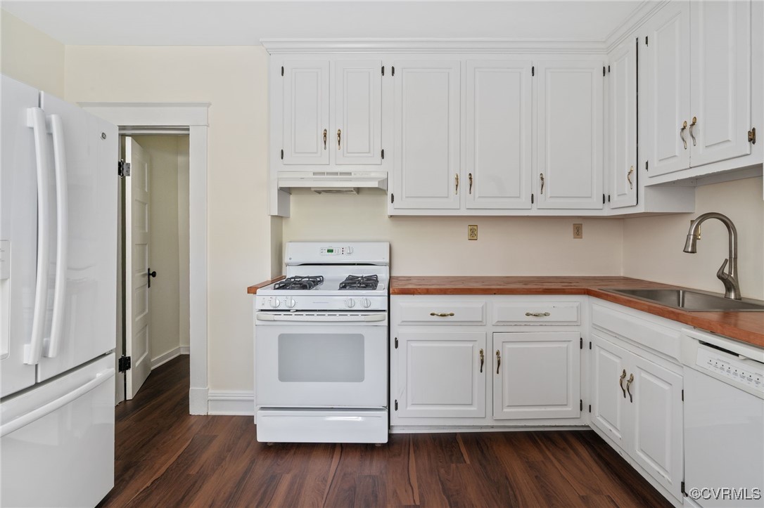 2707 Sherbourne Road Richmond, VA 23237 - Photo 19 of 50 Kitchen with white appliances, a sink, under cabin