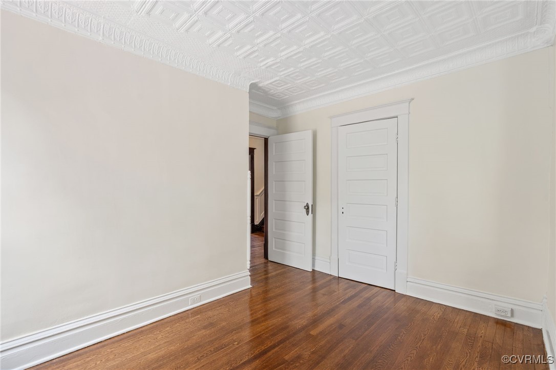 2707 Sherbourne Road Richmond, VA 23237 - Photo 29 of 50 Bedroom featuring wood finished floors, an ornate