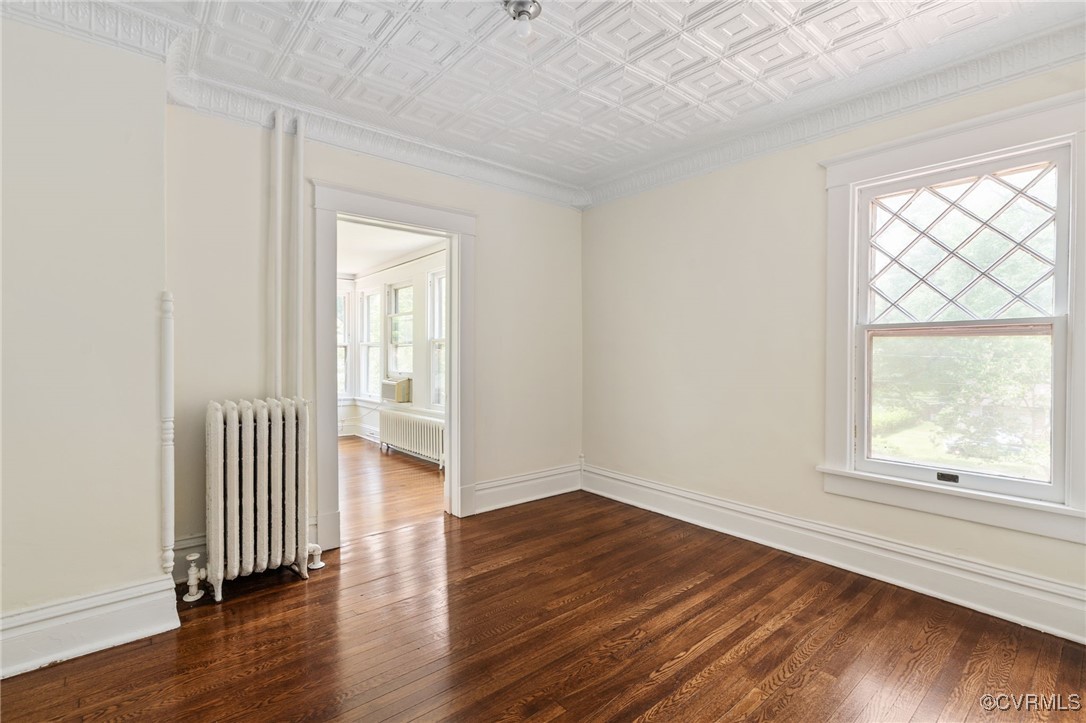 2707 Sherbourne Road Richmond, VA 23237 - Photo 31 of 50 Bedroom with radiator, radiator heating unit, an o