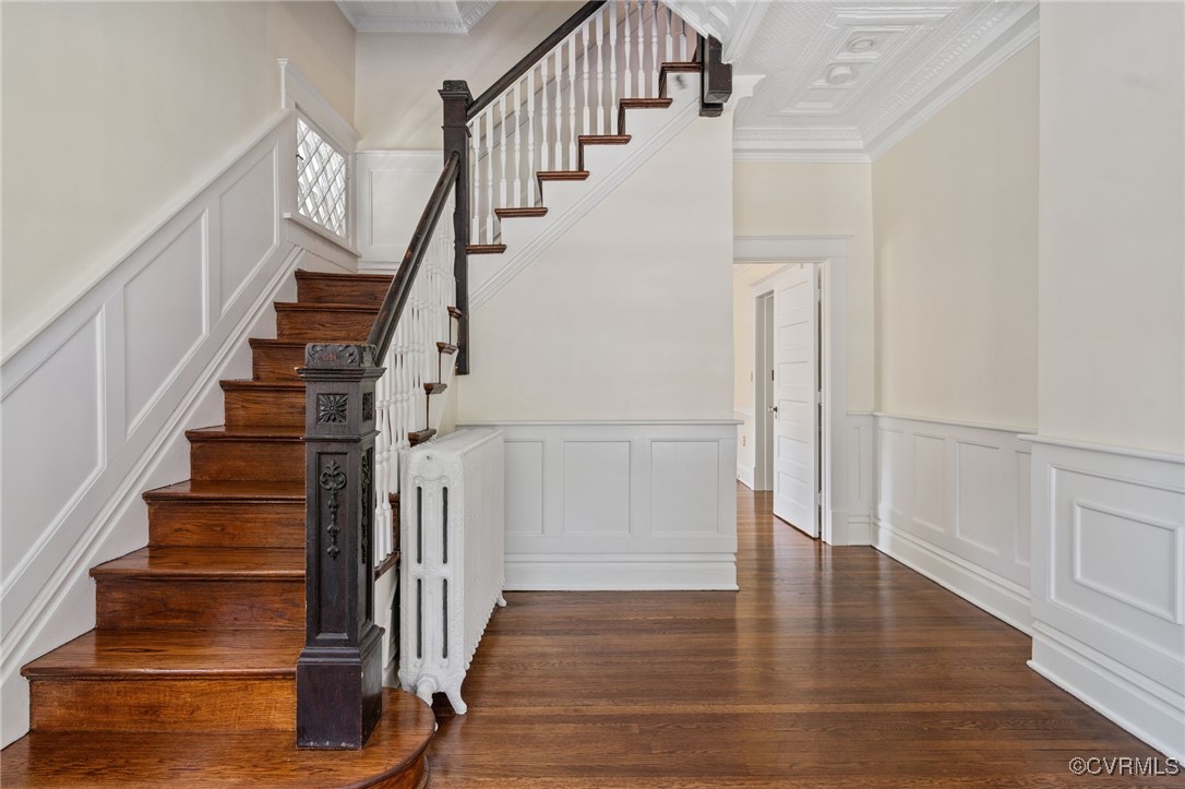 2707 Sherbourne Road Richmond, VA 23237 - Photo 4 of 50 Stairs featuring a decorative wall, crown molding,