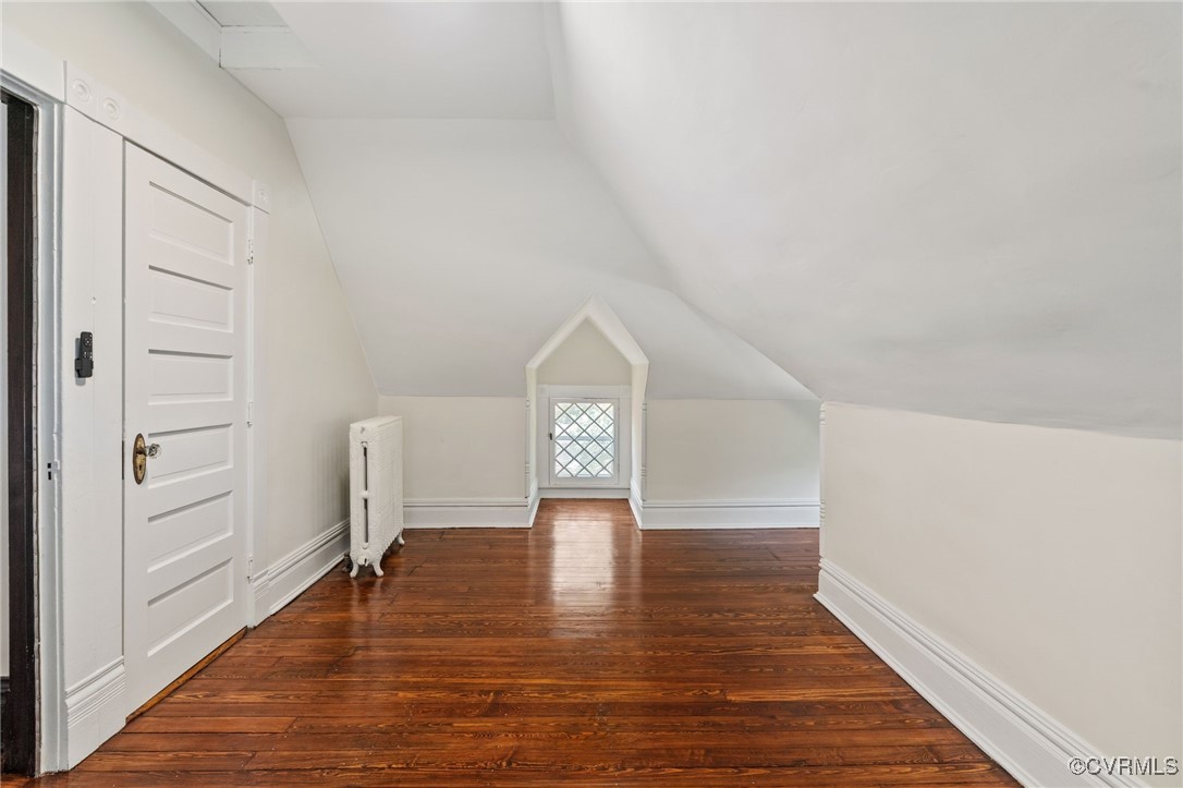2707 Sherbourne Road Richmond, VA 23237 - Photo 42 of 50 Bedroom with hardwood floors, vaulted ceiling, and