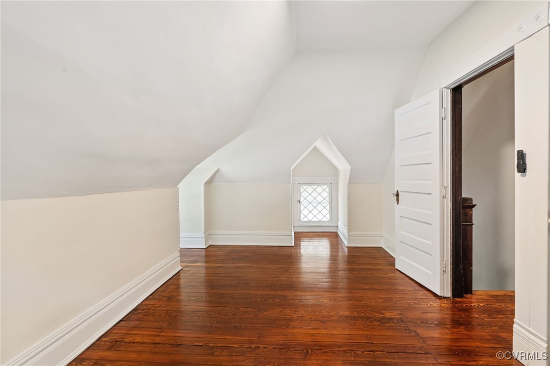 2707 Sherbourne Road Richmond, VA 23237 - Photo 44 of 50 Bedroom featuring lofted ceiling and hardwood floo