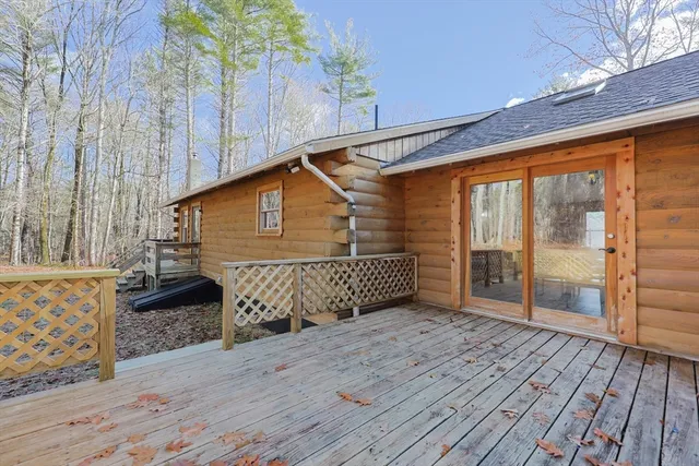 a backyard of a house with large trees