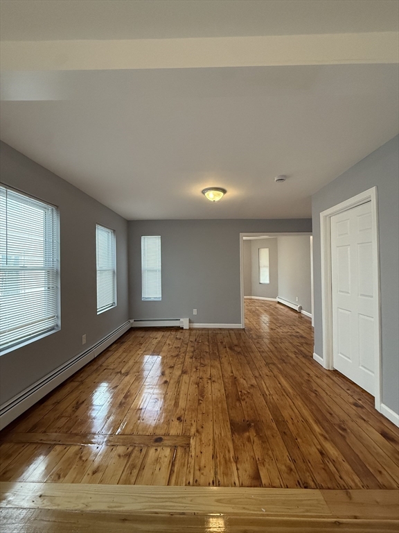 69 Hollis Street, Unit 13 Worcester, MA 01610 - Photo 6 of 8 a view of an empty room and window