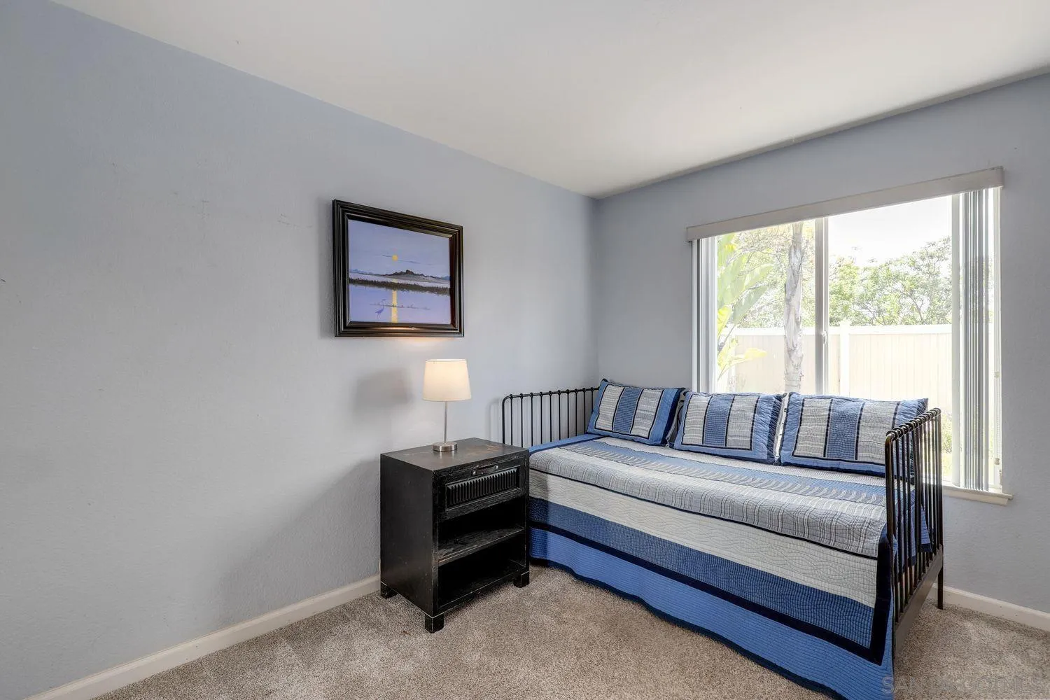 8531 Menkar Road San Diego, CA 92126 - Photo 17 of 37 a living room with furniture and a window