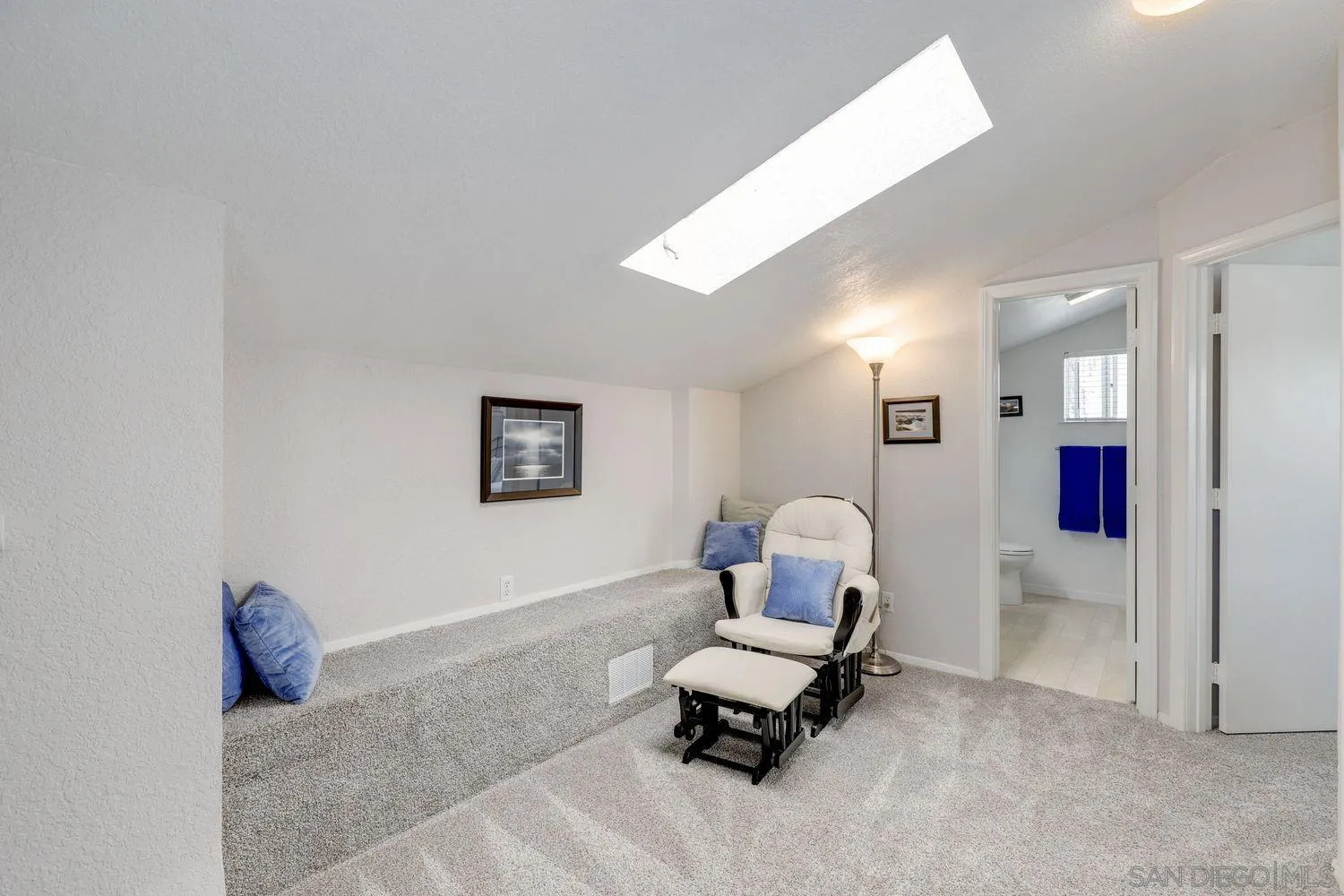 8531 Menkar Road San Diego, CA 92126 - Photo 19 of 37 a living room with furniture